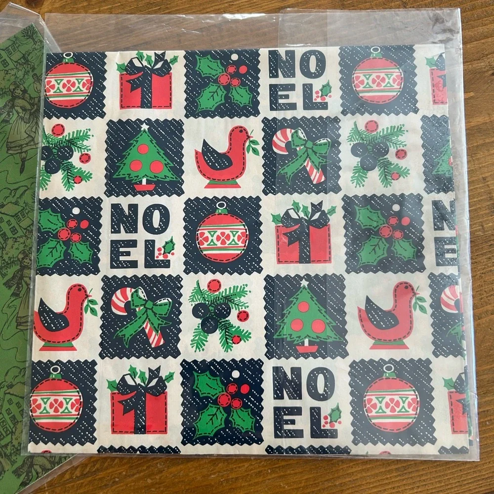 Bundle of vintage Christmas wrapping papers and card